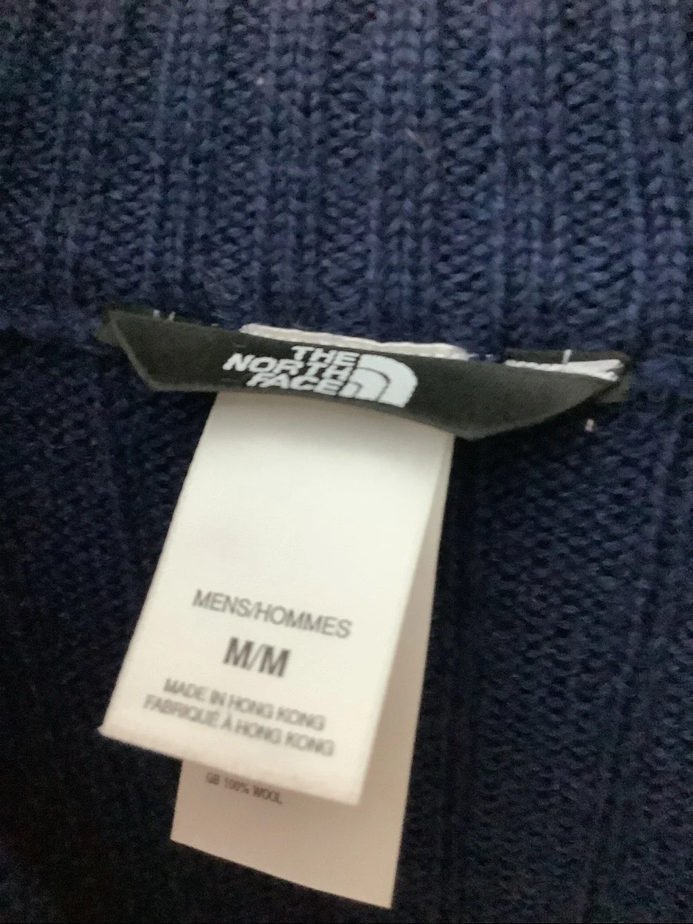 North Face 100% wool navy with gray stripes 1/4-zip sweater, size medium